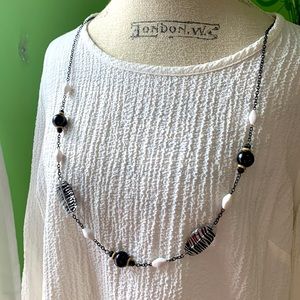 JM Collection. White 3/4 length sleeve with attached beaded necklace. NWOT